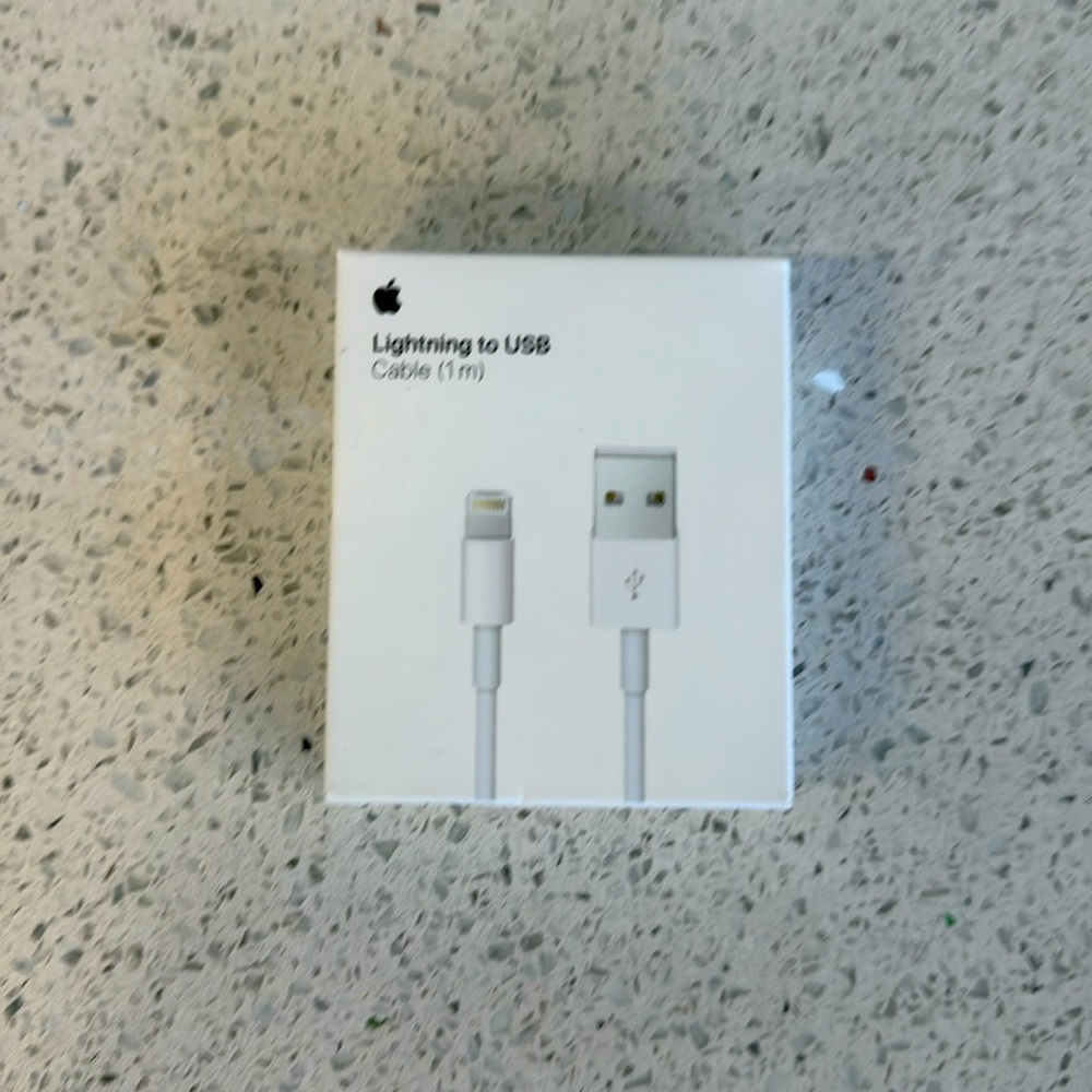 Apple lightning to USB charging cable brand new still in the box.